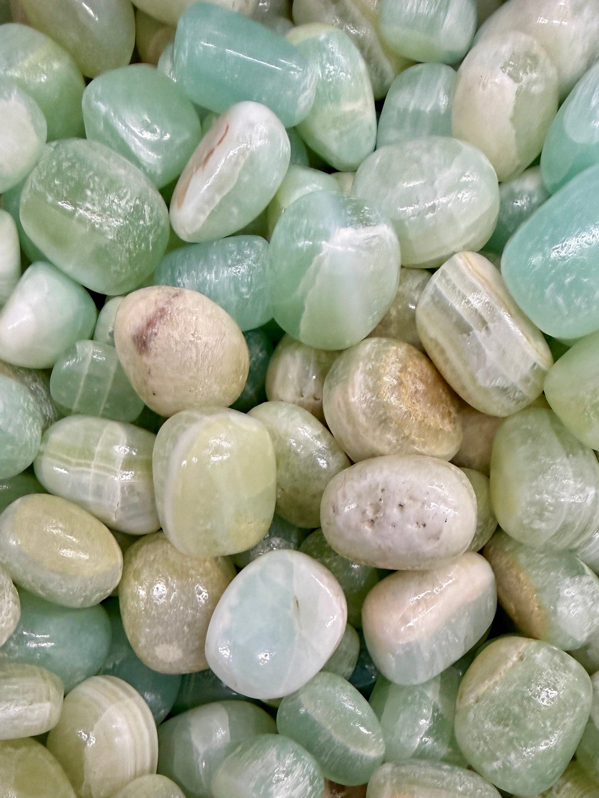 Aqua Calcite Tumbled Pocket Stone